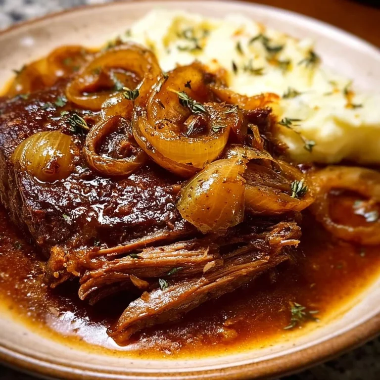 Delicious juicy French onion pot roast served with vegetables