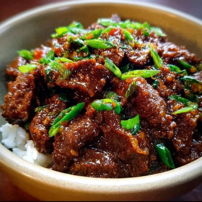 Slow Cooker Mongolian Beef dish with tender meat and delicious sauce